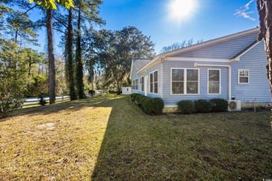 What a lovely home this one is, and it's just minutes from the on Pawleys Plantation Golf and Country Club in South Carolina - for sale on GolfHomes.com, golf home, golf lot