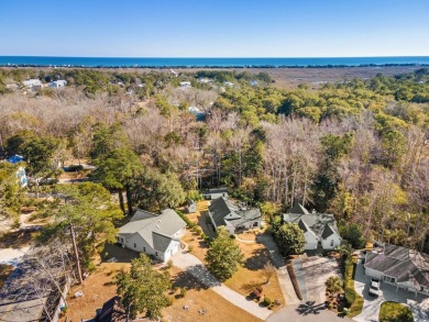 What a lovely home this one is, and it's just minutes from the on Pawleys Plantation Golf and Country Club in South Carolina - for sale on GolfHomes.com, golf home, golf lot