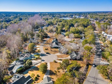 What a lovely home this one is, and it's just minutes from the on Pawleys Plantation Golf and Country Club in South Carolina - for sale on GolfHomes.com, golf home, golf lot