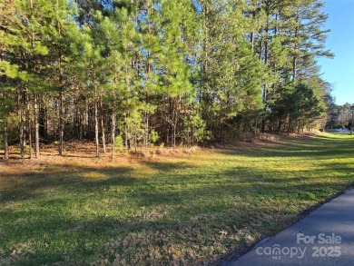 This Badin Lake area lot is located in the prestigious gated on Old North State Club at Uwharrie Point Golf community in North Carolina - for sale on GolfHomes.com, golf home, golf lot