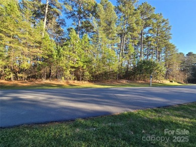 This Badin Lake area lot is located in the prestigious gated on Old North State Club at Uwharrie Point Golf community in North Carolina - for sale on GolfHomes.com, golf home, golf lot