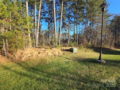 This Badin Lake area lot is located in the prestigious gated on Old North State Club at Uwharrie Point Golf community in North Carolina - for sale on GolfHomes.com, golf home, golf lot