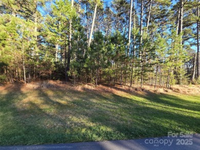 This Badin Lake area lot is located in the prestigious gated on Old North State Club at Uwharrie Point Golf community in North Carolina - for sale on GolfHomes.com, golf home, golf lot