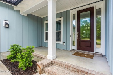 Looking for a practically NEW and move in ready home in Compass on Compass Pointe Golf Course in North Carolina - for sale on GolfHomes.com, golf home, golf lot