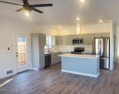 Charming 2-bedroom, 2-bath cottage nestled in a peaceful on Sandpoint Elks Golf Course in Idaho - for sale on GolfHomes.com, golf home, golf lot