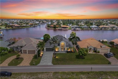 Welcome to your GULF ACCESS DREAM HOME! A commanding 4-bedroom on Palmetto-Pine Country Club in Florida - for sale on GolfHomes.com, golf home, golf lot