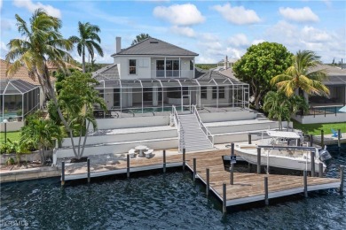 Welcome to your GULF ACCESS DREAM HOME! A commanding 4-bedroom on Palmetto-Pine Country Club in Florida - for sale on GolfHomes.com, golf home, golf lot