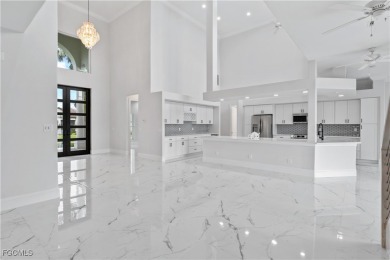 Welcome to your GULF ACCESS DREAM HOME! A commanding 4-bedroom on Palmetto-Pine Country Club in Florida - for sale on GolfHomes.com, golf home, golf lot