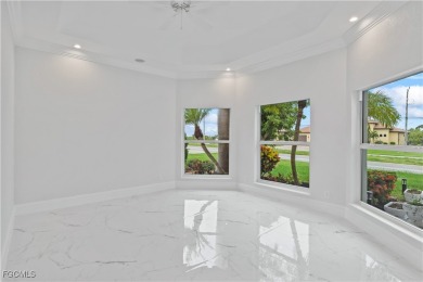 Welcome to your GULF ACCESS DREAM HOME! A commanding 4-bedroom on Palmetto-Pine Country Club in Florida - for sale on GolfHomes.com, golf home, golf lot