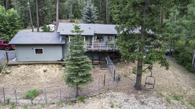 BEAUTIFUL SETTING NEXT TO BABBLING CREEK, PLUS NEW 50 YEAR ROOF! on Plumas Pines Golf Resort in California - for sale on GolfHomes.com, golf home, golf lot