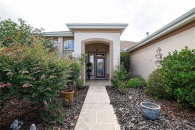 Discover your dream home in this exquisite 1936 sq. ft. Sanibel on Eagle Ridge At Spruce Creek Country Club in Florida - for sale on GolfHomes.com, golf home, golf lot