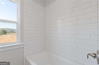 Welcome to your dream home at 3257 Traditions Way, a beautifully on Traditions of Braselton Golf Club in Georgia - for sale on GolfHomes.com, golf home, golf lot