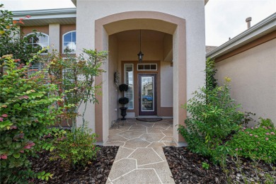 Discover your dream home in this exquisite 1936 sq. ft. Sanibel on Eagle Ridge At Spruce Creek Country Club in Florida - for sale on GolfHomes.com, golf home, golf lot