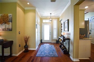 Discover your dream home in this exquisite 1936 sq. ft. Sanibel on Eagle Ridge At Spruce Creek Country Club in Florida - for sale on GolfHomes.com, golf home, golf lot