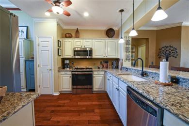 Discover your dream home in this exquisite 1936 sq. ft. Sanibel on Eagle Ridge At Spruce Creek Country Club in Florida - for sale on GolfHomes.com, golf home, golf lot