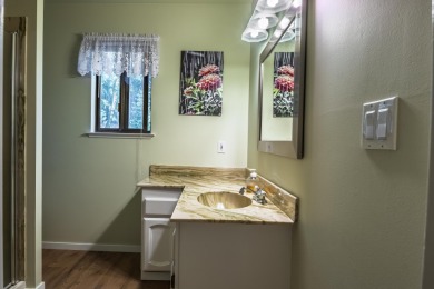 BEAUTIFUL SETTING NEXT TO BABBLING CREEK, PLUS NEW 50 YEAR ROOF! on Plumas Pines Golf Resort in California - for sale on GolfHomes.com, golf home, golf lot