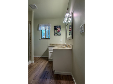 BEAUTIFUL SETTING NEXT TO BABBLING CREEK, PLUS NEW 50 YEAR ROOF! on Plumas Pines Golf Resort in California - for sale on GolfHomes.com, golf home, golf lot