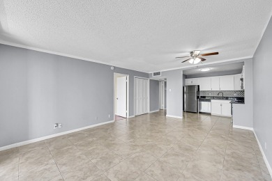 ALL AGES condo blends style & function! Spacious bedroom on Inverrary Country Club in Florida - for sale on GolfHomes.com, golf home, golf lot