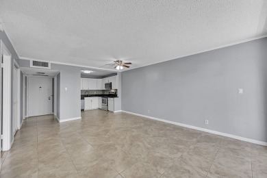 ALL AGES condo blends style & function! Spacious bedroom on Inverrary Country Club in Florida - for sale on GolfHomes.com, golf home, golf lot