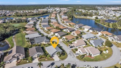 NEAT AS A PIN Sheffield home on LARGE corner lot in the gated on Kings Gate Golf Club in Florida - for sale on GolfHomes.com, golf home, golf lot