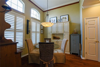 Discover your dream home in this exquisite 1936 sq. ft. Sanibel on Eagle Ridge At Spruce Creek Country Club in Florida - for sale on GolfHomes.com, golf home, golf lot
