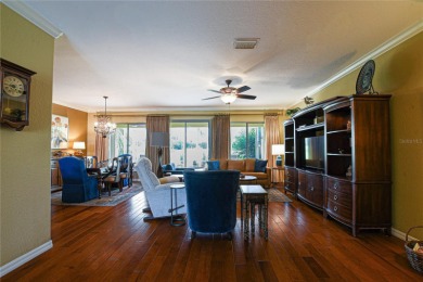 Discover your dream home in this exquisite 1936 sq. ft. Sanibel on Eagle Ridge At Spruce Creek Country Club in Florida - for sale on GolfHomes.com, golf home, golf lot