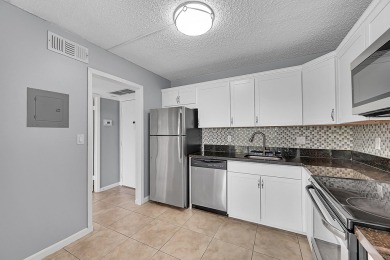 ALL AGES condo blends style & function! Spacious bedroom on Inverrary Country Club in Florida - for sale on GolfHomes.com, golf home, golf lot
