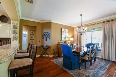 Discover your dream home in this exquisite 1936 sq. ft. Sanibel on Eagle Ridge At Spruce Creek Country Club in Florida - for sale on GolfHomes.com, golf home, golf lot