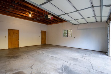 BEAUTIFUL SETTING NEXT TO BABBLING CREEK, PLUS NEW 50 YEAR ROOF! on Plumas Pines Golf Resort in California - for sale on GolfHomes.com, golf home, golf lot