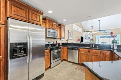 Welcome to this beautifully designed all-brick zero-lot home on The Legends of Champaign in Illinois - for sale on GolfHomes.com, golf home, golf lot