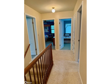 Wonderful opportunity to own this 4 bed/3 bath home close to on Atlantic Country Club in Iowa - for sale on GolfHomes.com, golf home, golf lot