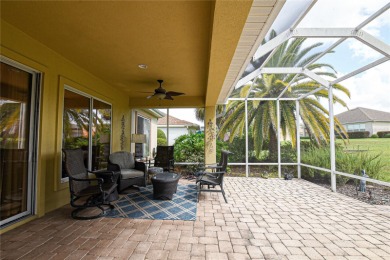 Discover your dream home in this exquisite 1936 sq. ft. Sanibel on Eagle Ridge At Spruce Creek Country Club in Florida - for sale on GolfHomes.com, golf home, golf lot