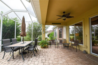 Discover your dream home in this exquisite 1936 sq. ft. Sanibel on Eagle Ridge At Spruce Creek Country Club in Florida - for sale on GolfHomes.com, golf home, golf lot