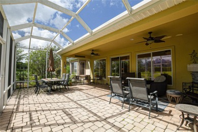 Discover your dream home in this exquisite 1936 sq. ft. Sanibel on Eagle Ridge At Spruce Creek Country Club in Florida - for sale on GolfHomes.com, golf home, golf lot