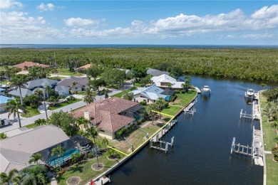 SAIL ACCESS POOL HOME IN PGI W/110FT SEAWALL, 3-CAR GARAGE on Saint Andrews South Golf Club in Florida - for sale on GolfHomes.com, golf home, golf lot