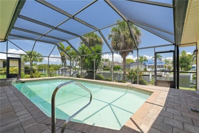 SAIL ACCESS POOL HOME IN PGI W/110FT SEAWALL, 3-CAR GARAGE on Saint Andrews South Golf Club in Florida - for sale on GolfHomes.com, golf home, golf lot