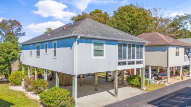 Welcome to your coastal retreat in the sought-after Willow Creek on Possum Trot Golf Course in South Carolina - for sale on GolfHomes.com, golf home, golf lot