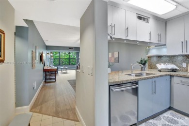 Beautifully updated & artist-decorated 2-bed, 2-bath condo with on Pine Island Ridge Country Club in Florida - for sale on GolfHomes.com, golf home, golf lot