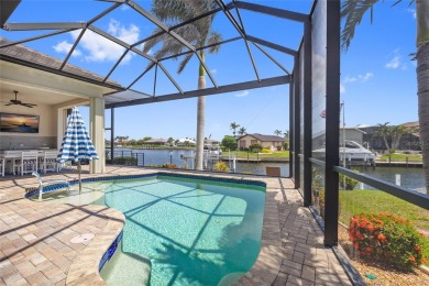 PUNTA GORDA ISLES!! STUNNING 3 BEDROOM PLUS DEN, 3 BATH, 3 CAR on Saint Andrews South Golf Club in Florida - for sale on GolfHomes.com, golf home, golf lot