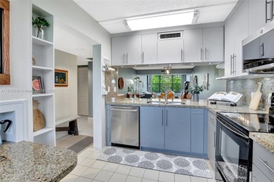 Beautifully updated & artist-decorated 2-bed, 2-bath condo with on Pine Island Ridge Country Club in Florida - for sale on GolfHomes.com, golf home, golf lot