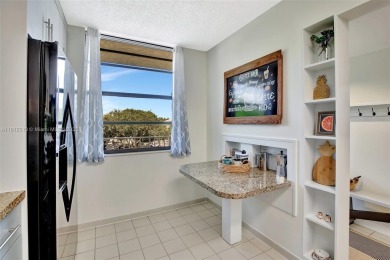 Beautifully updated & artist-decorated 2-bed, 2-bath condo with on Pine Island Ridge Country Club in Florida - for sale on GolfHomes.com, golf home, golf lot