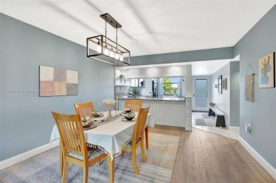 Beautifully updated & artist-decorated 2-bed, 2-bath condo with on Pine Island Ridge Country Club in Florida - for sale on GolfHomes.com, golf home, golf lot