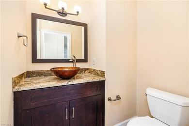 Discover exceptional value in this true four-bedroom residence on The Colony Golf and Country Club in Florida - for sale on GolfHomes.com, golf home, golf lot