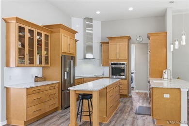 Experience elevated Florida living in this beautifully designed on Southern Woods Golf Club in Florida - for sale on GolfHomes.com, golf home, golf lot