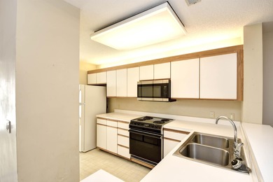 This 2 bedroom, 2 bath condo is located in the heart of Myrtle on Myrtlewood Golf Course and Club  in South Carolina - for sale on GolfHomes.com, golf home, golf lot