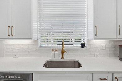 Imagine ending your day on the covered lanai, grilling in the on St. Johns Golf and Country Club in Florida - for sale on GolfHomes.com, golf home, golf lot