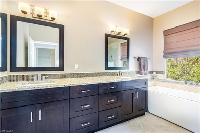 Discover exceptional value in this true four-bedroom residence on The Colony Golf and Country Club in Florida - for sale on GolfHomes.com, golf home, golf lot