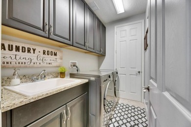 624 Winterside Drive | 4 Beds | 3 Baths | 3-Car Garage | 2,558 on Apollo Beach Golf and Sea Club in Florida - for sale on GolfHomes.com, golf home, golf lot