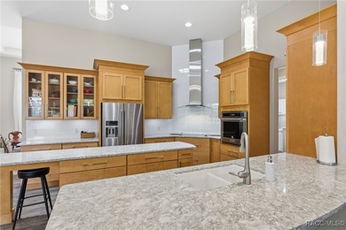 Experience elevated Florida living in this beautifully designed on Southern Woods Golf Club in Florida - for sale on GolfHomes.com, golf home, golf lot