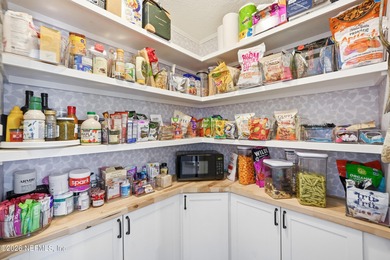 Imagine ending your day on the covered lanai, grilling in the on St. Johns Golf and Country Club in Florida - for sale on GolfHomes.com, golf home, golf lot